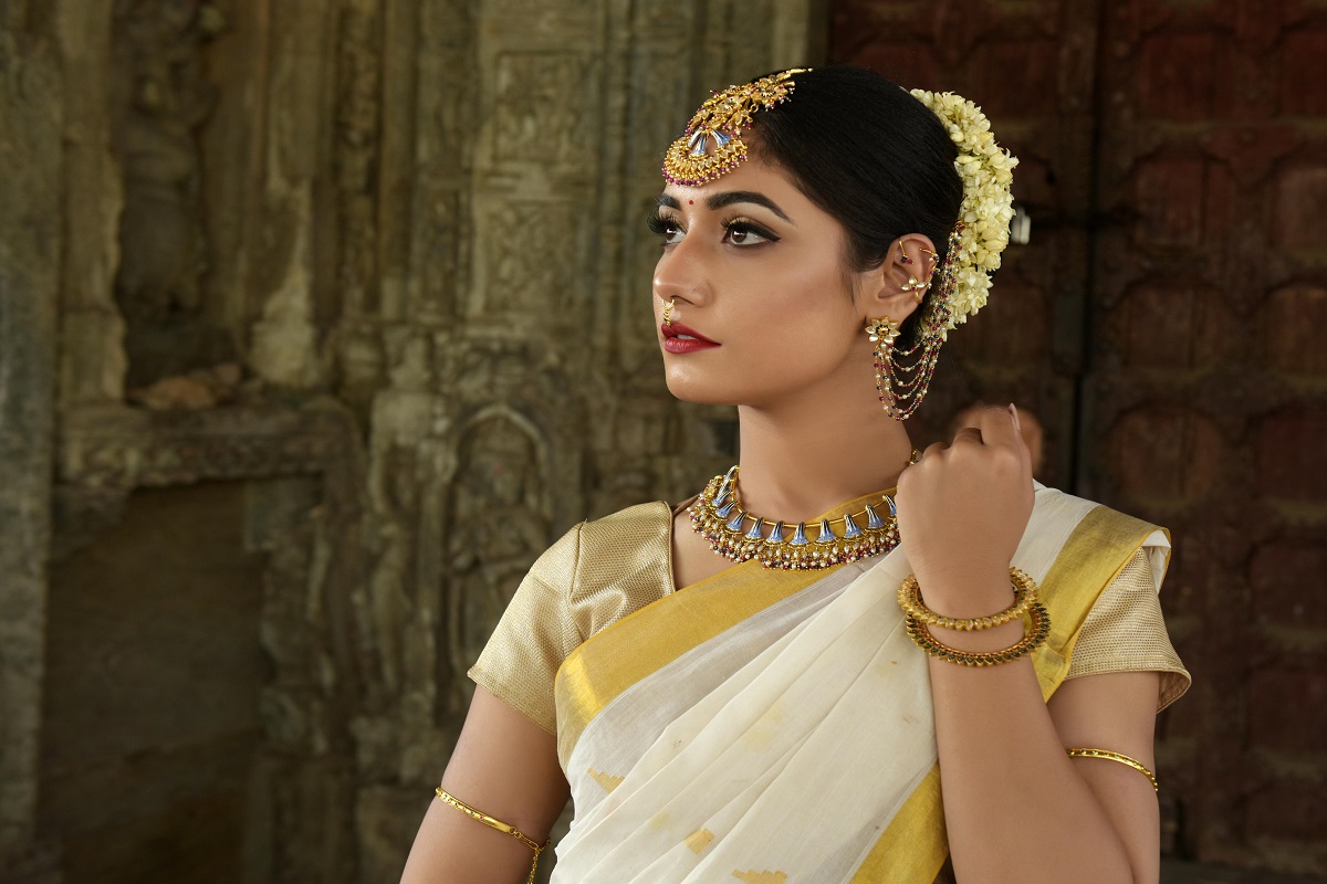 Gold necklace on display